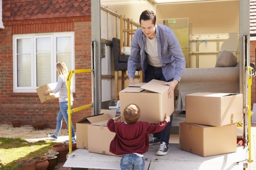 Staff preparing for an office relocation in Feltham