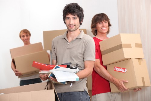 Organized self storage unit in Feltham with packed boxes